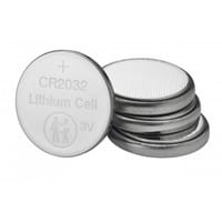 A stack of silver Verbatim CR2032 lithium coin cells sits beside one battery showing its 3V label.